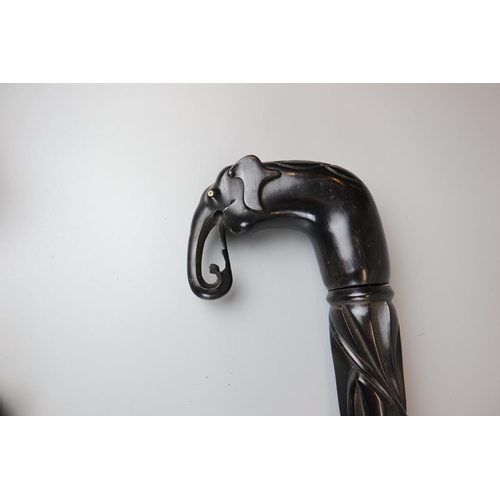 81 - Cambodian ebony carved walking stick in the form of an elephant