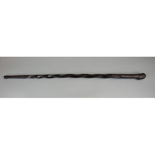 85 - Ebonised carved walking cane