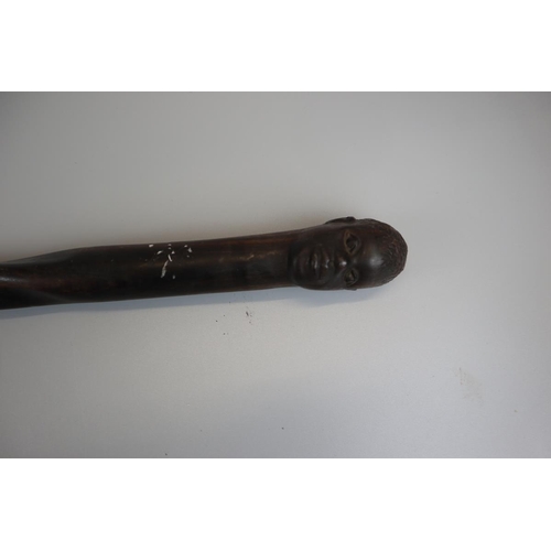 85 - Ebonised carved walking cane