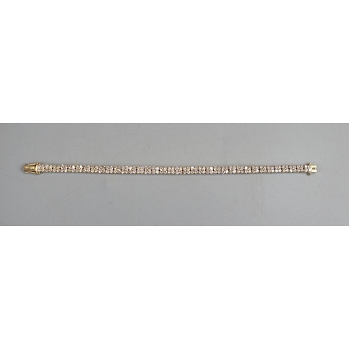 28 - Fine 18ct gold diamond bracelet