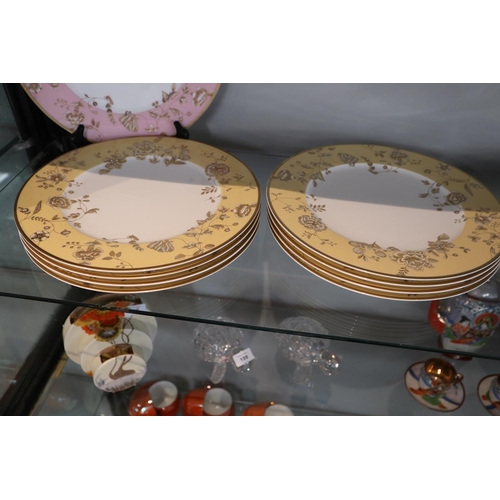 111 - A set of 12 Villeroy and Boch plates together with another