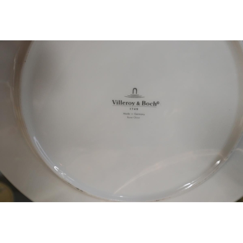 111 - A set of 12 Villeroy and Boch plates together with another