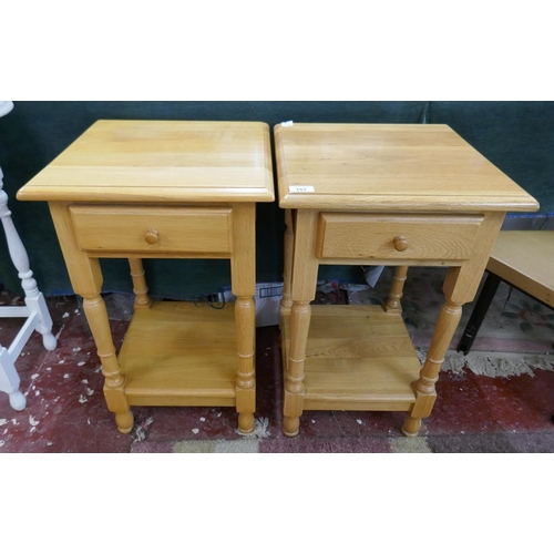 153 - Pair of oak bedside tables