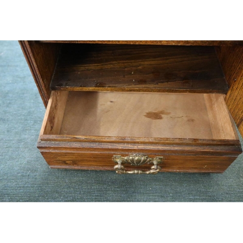 169 - Antique oak pipe cabinet with key