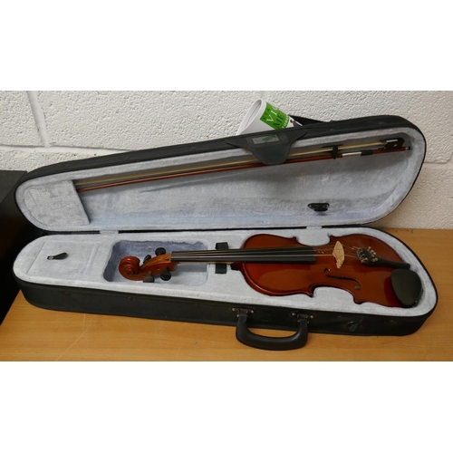 217 - Prima violin and case with violin books