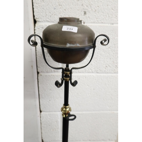 231 - Wrought iron adjustable lamp