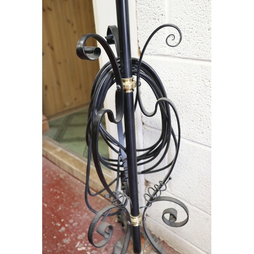 231 - Wrought iron adjustable lamp