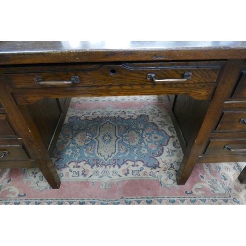 251 - Large oak partners desk by British Bell-Barn office furniture - Approx W: 150cm D: 122cm H: 76cm