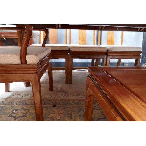 288 - Oriental themed extending table and 8 chairs to include 2 carvers - Approx table size L: 215cm W: 11... 