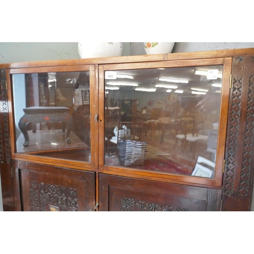 303 - Oriental themed corner cabinet with well carved panels