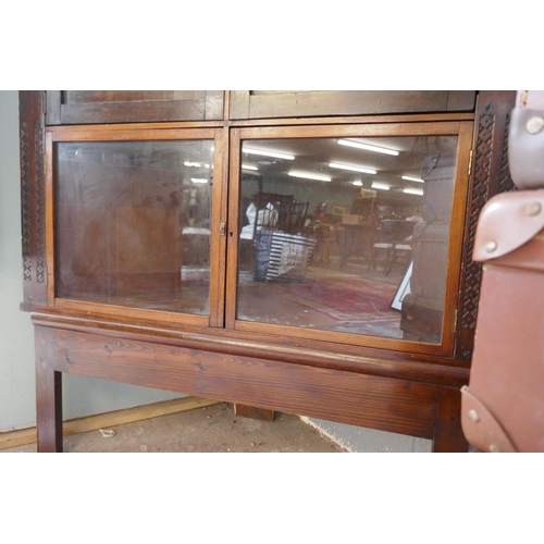 303 - Oriental themed corner cabinet with well carved panels