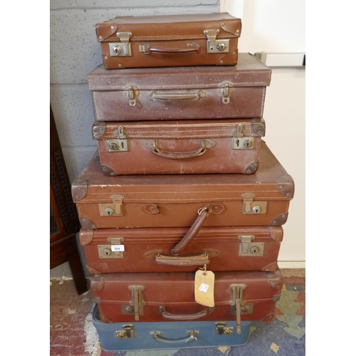 304 - Collection of vintage suitcases