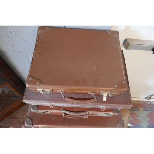 304 - Collection of vintage suitcases