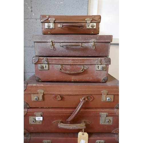 304 - Collection of vintage suitcases