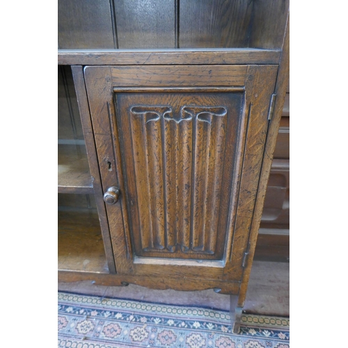 310 - Oak linen fold bookcase - Approx W: 107cm D: 30cm H: 95cm