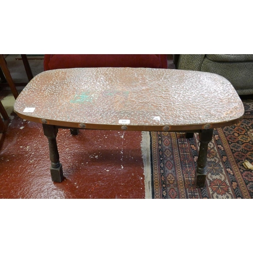 317 - Coffee table with beaten copper top