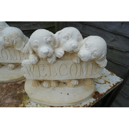 345 - 3 stone welcome dog statues