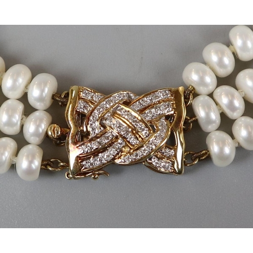 38 - Pearl choker with 18ct gold and diamond clasp