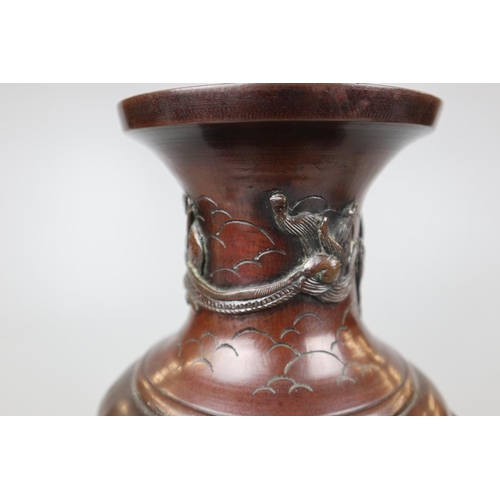 95 - Large bronze vase on carved wooded base - Approx H: 42cm