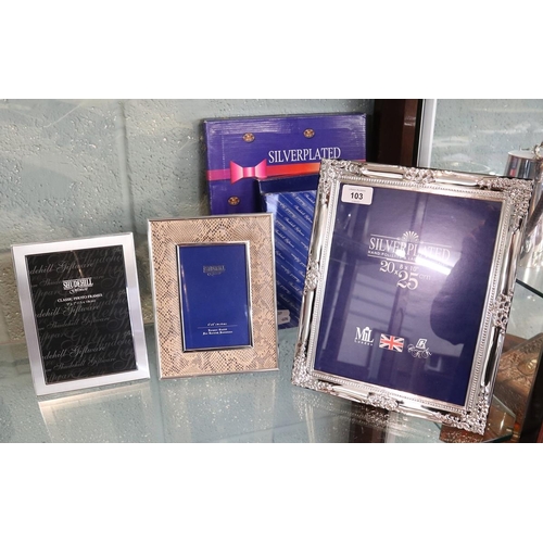 103 - 3 silver plated photo frames in original boxes