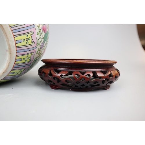 121 - Chinese ginger jar on carved wooden stand