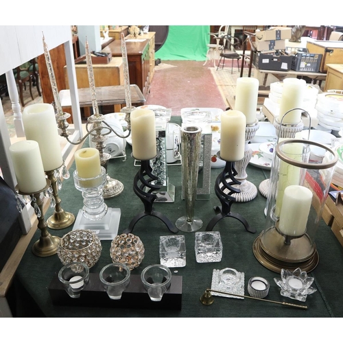 176 - Large collection of candlesticks