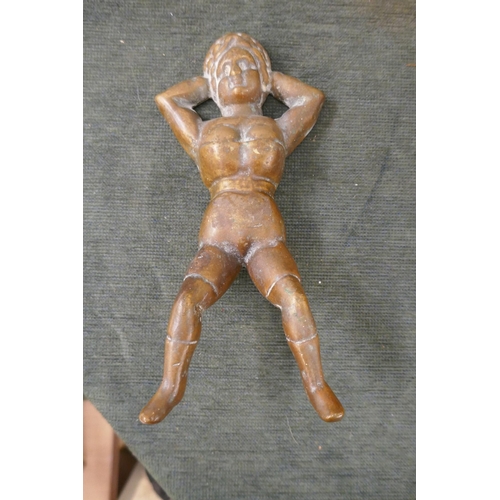 189 - Brass boot lifter in the form of a woman