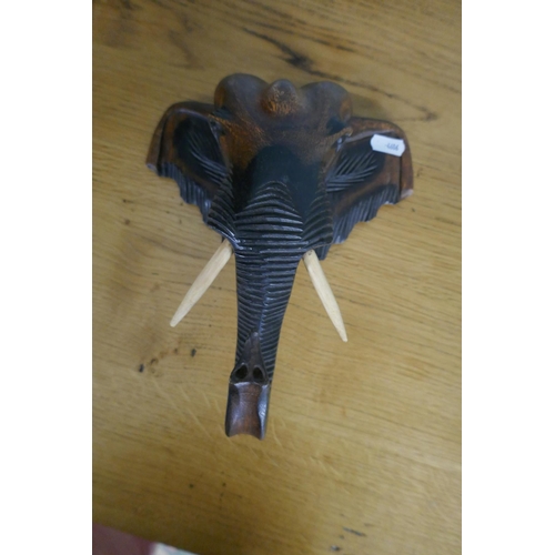 243 - Wooden carved African mask and elephant head