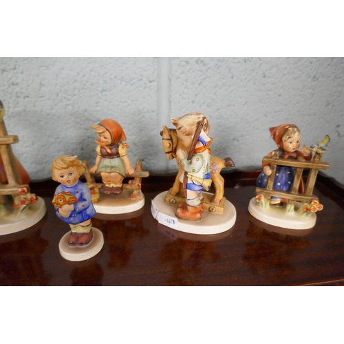 251 - A selection of Goebel figurines with playtime theme after sister Marie Hummel's drawings. All polych... 