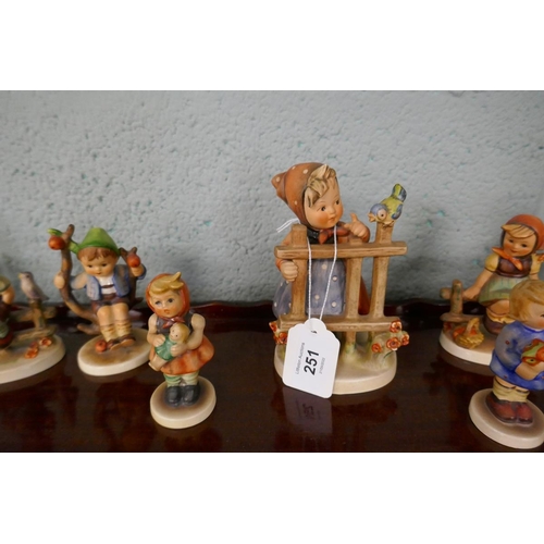 251 - A selection of Goebel figurines with playtime theme after sister Marie Hummel's drawings. All polych... 