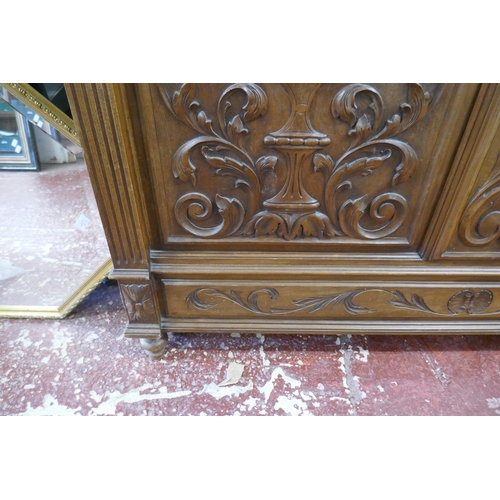 265 - French carved walnut double bed