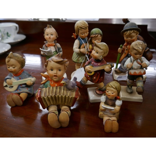 308 - A collection of Goebel figurines with musical theme after sister Marie Hummel's drawings. All are po... 