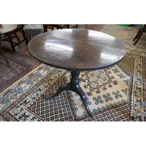 368 - Antique oak tilt top tripod table