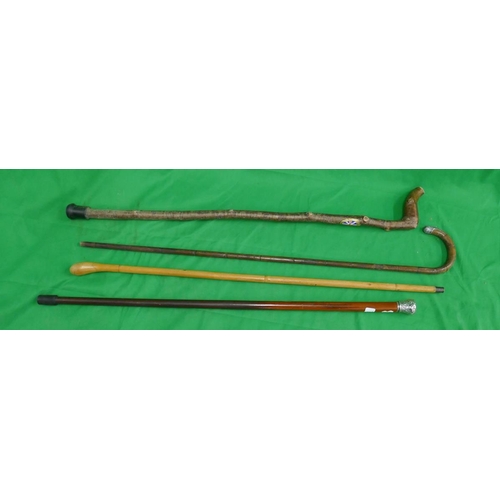 374 - 4 walking sticks to include silver mounted examples