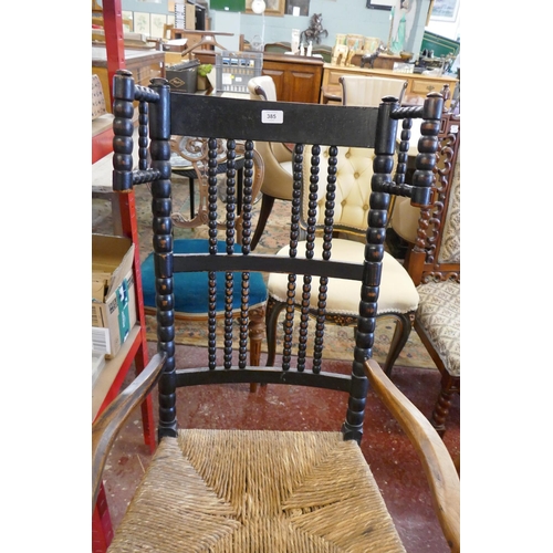 385 - Arts and Crafts bobbin turned rocking chair