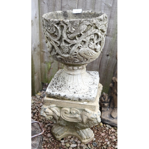 421 - Stone pedestal planter on plinth