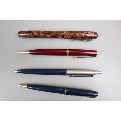 64 - Collection of pens