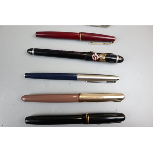 64 - Collection of pens