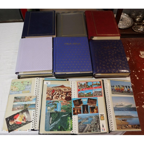 92 - Large collection of populated postcard albums