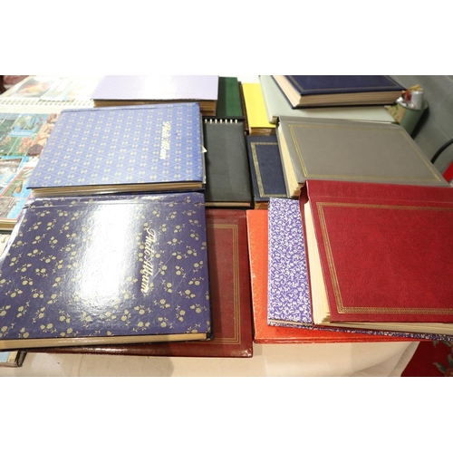 92 - Large collection of populated postcard albums