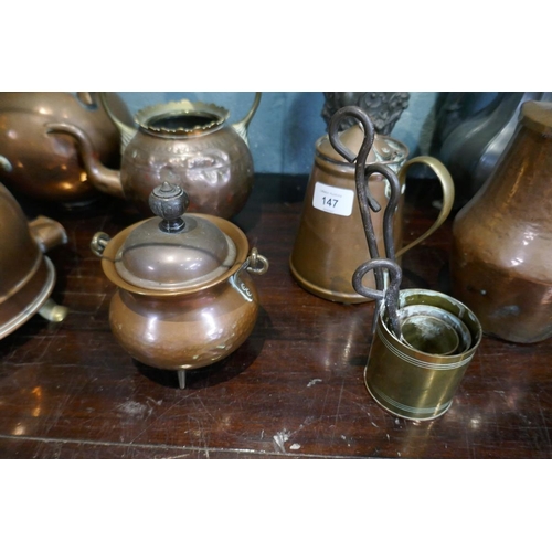 147 - Collection of metalware to include copper teapots etc