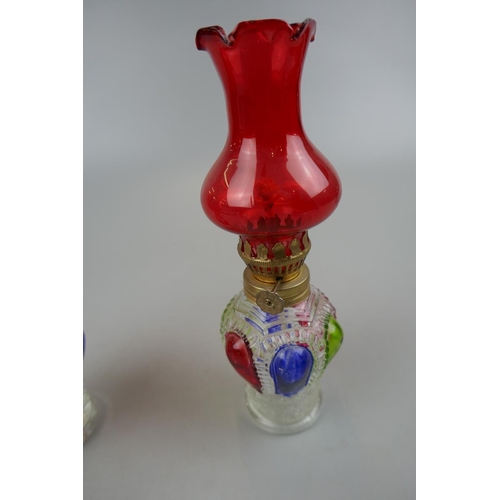 162 - Pair of coloured glass oil lamp lights - Approx. height: 20.5cm