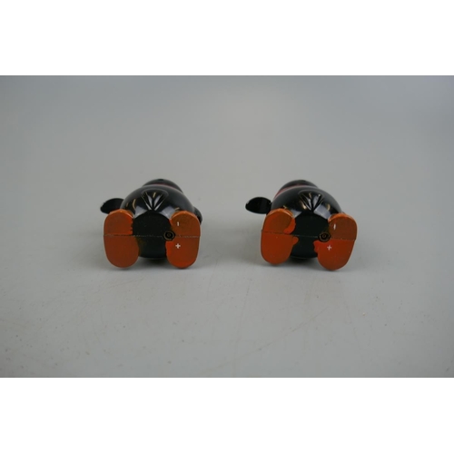 164 - Pair of novelty penguin lighters