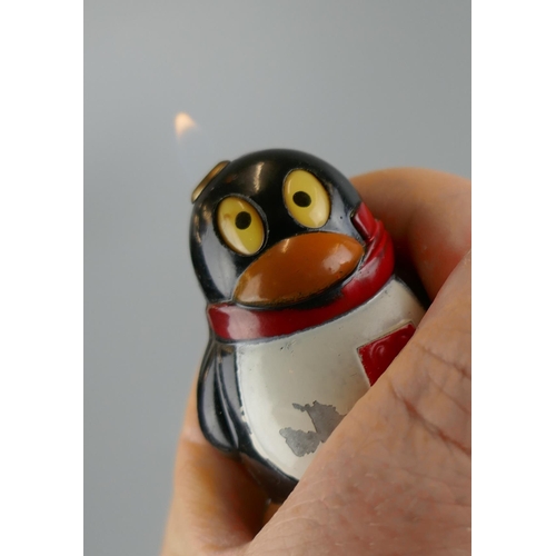 164 - Pair of novelty penguin lighters