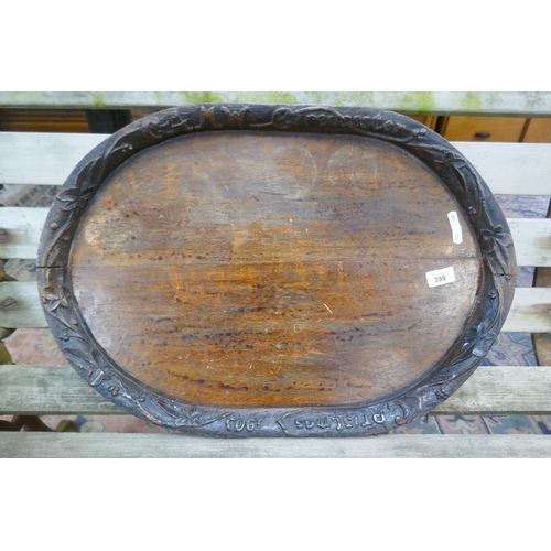 399 - Carved wooden serving tray marked Christmas 1903