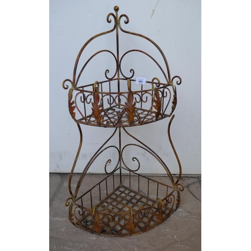 469 - Decorative metal corner shelves