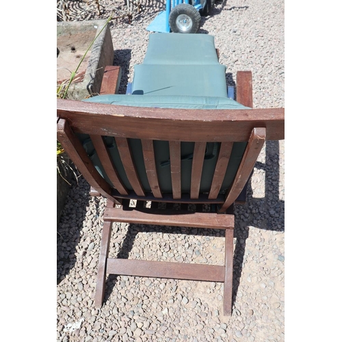 471 - Pair of good quality teak loungers with cushions