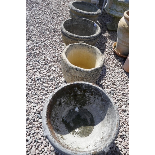 486 - 4 large stone planters 