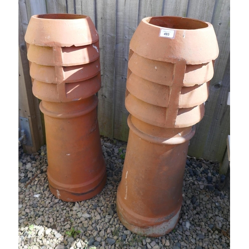 493 - Pair of terracotta chimney pots - Approx. height: 90cm