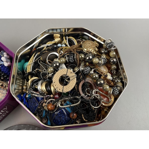 89 - 2 tins of costume jewellery